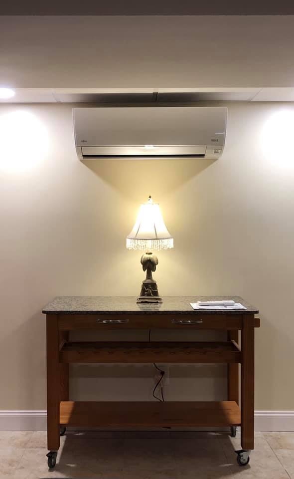 Wall-mount heat pump Wall-Mount Heat Pump Above Lamp