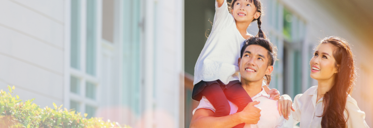 Happy Family Outside of House, with Daughter Sitting on Dad's Shoulders